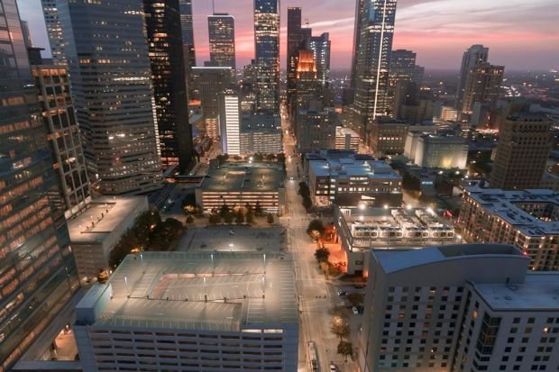 A beautiful aerial view of Houston's skyline at twilight showcasing the city's vibrant urban atmosphere.